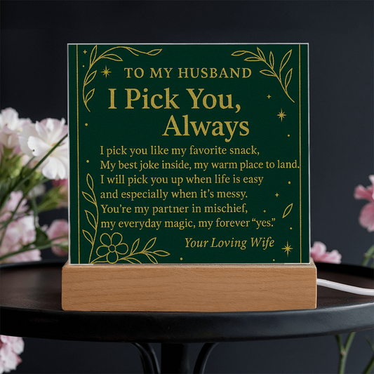 Heart‑shaped acrylic plaque, deep forest green background, gold foil text reading “TO MY HUSBAND — Blessed to Love You…”, botanical gold accents