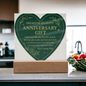 Heart‑shaped acrylic plaque, deep forest green background, gold foil text reading “TO MY HUSBAND — Blessed to Love You…”, botanical gold accents